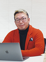飯田 憲幸 氏